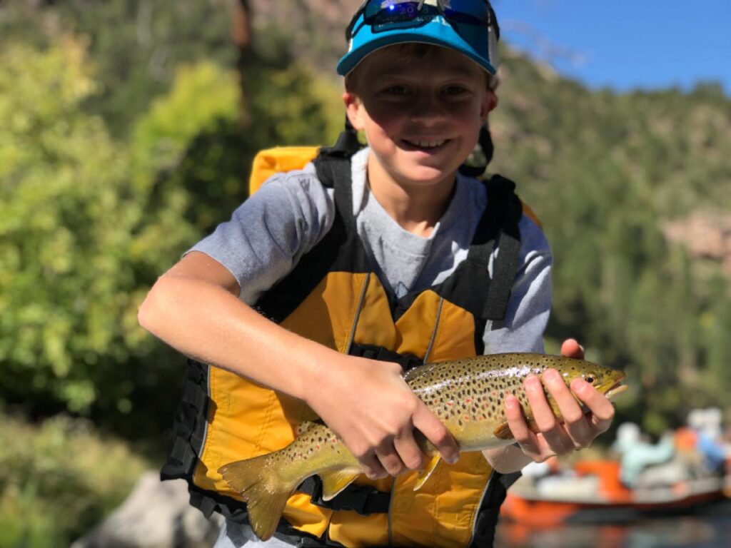 Green river trout fishing in a drift boat Dutch john resort fly fishing guides