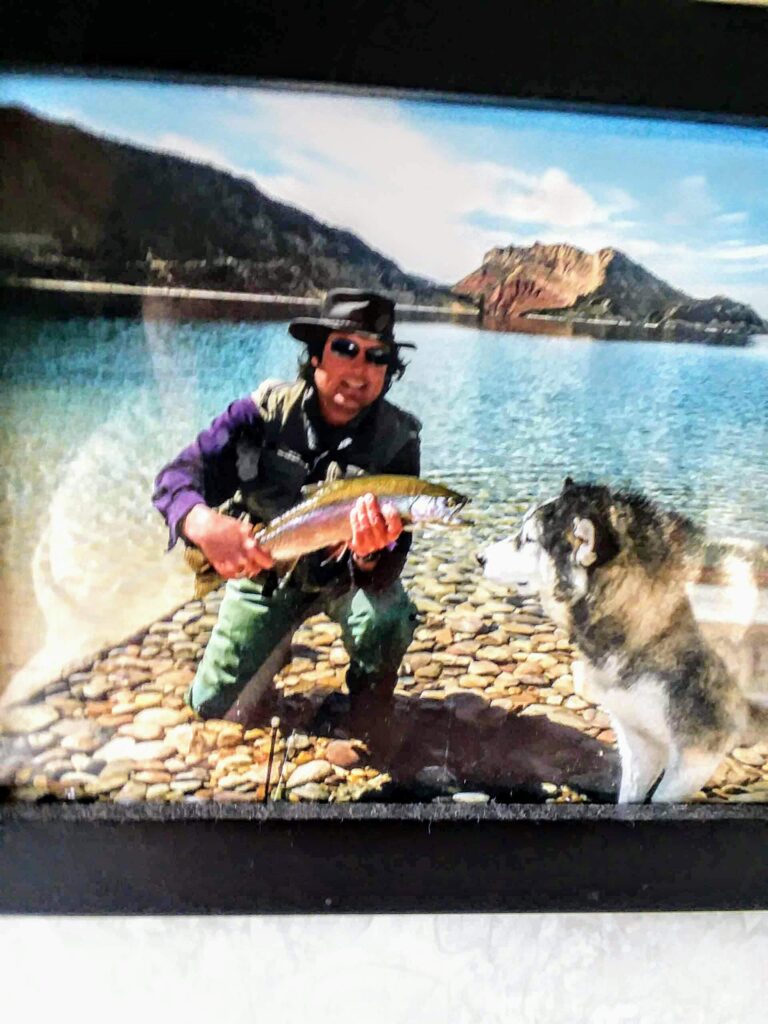 Guys holding a fish they just caught